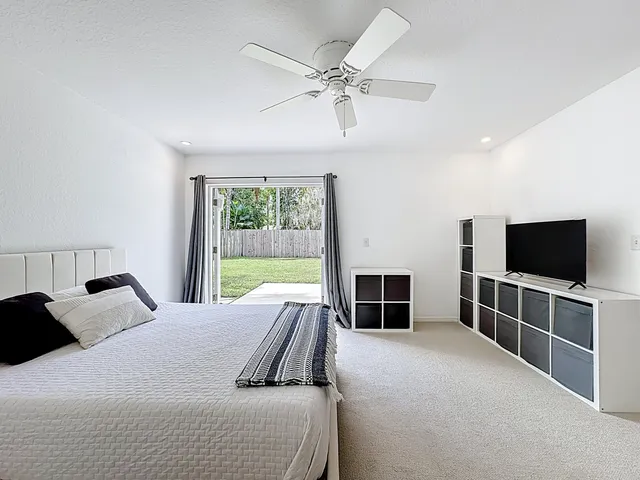 a front view of house with yard having outdoor seating