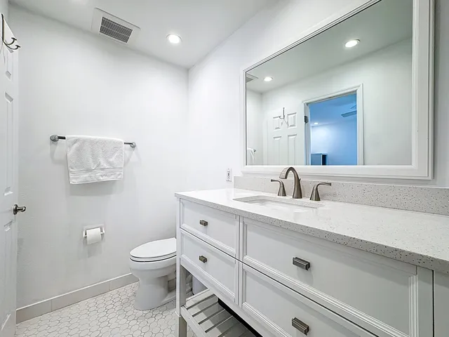 a view of a house with a yard porch and sitting area