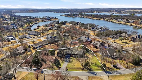 an aerial view of residential building and lake view
