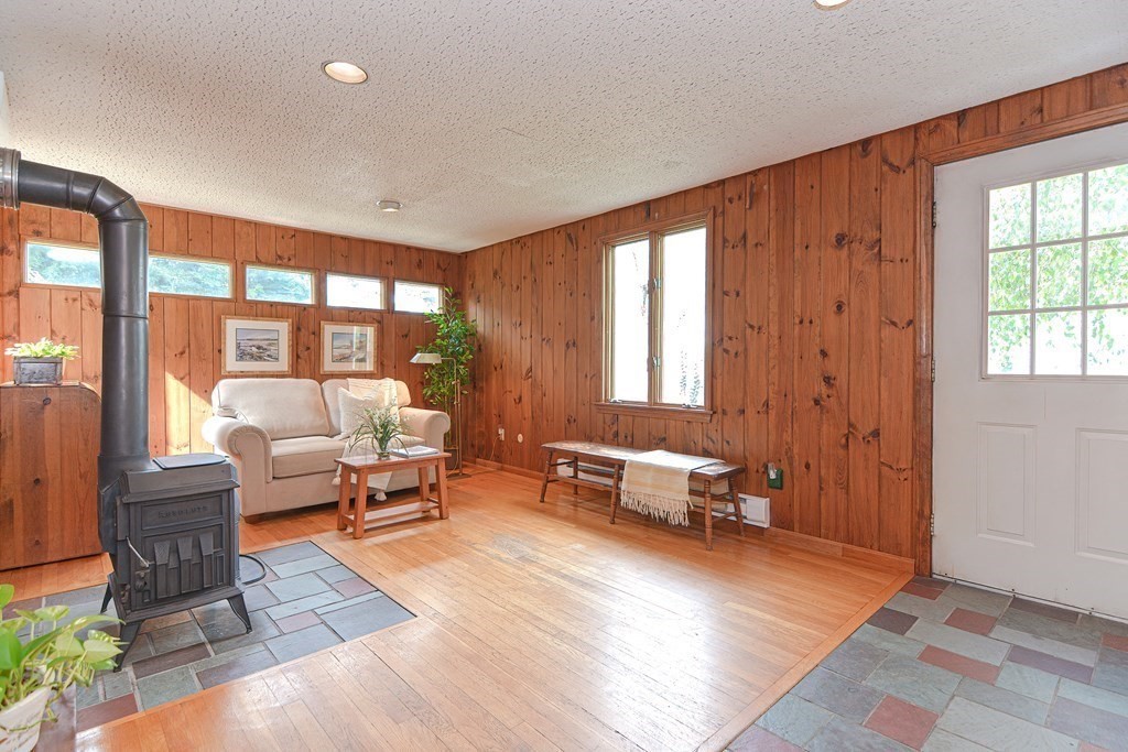 11 Wilde Road Wellesley, MA 02481 - Photo 13 of 26 a living room with furniture and large windows
