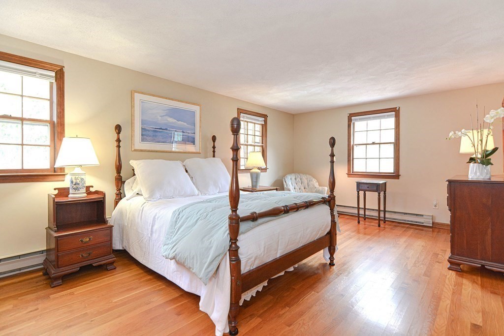 11 Wilde Road Wellesley, MA 02481 - Photo 16 of 26 a bed room with a bed and a tv