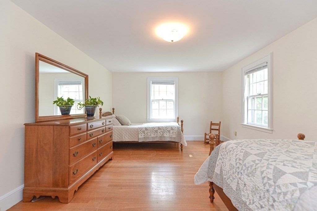 11 Wilde Road Wellesley, MA 02481 - Photo 18 of 26 a bedroom with a bed and a dresser