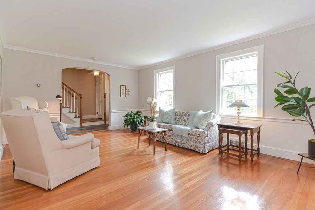 11 Wilde Road Wellesley, MA 02481 - Photo 3 of 26 a living room with furniture and a wooden floor