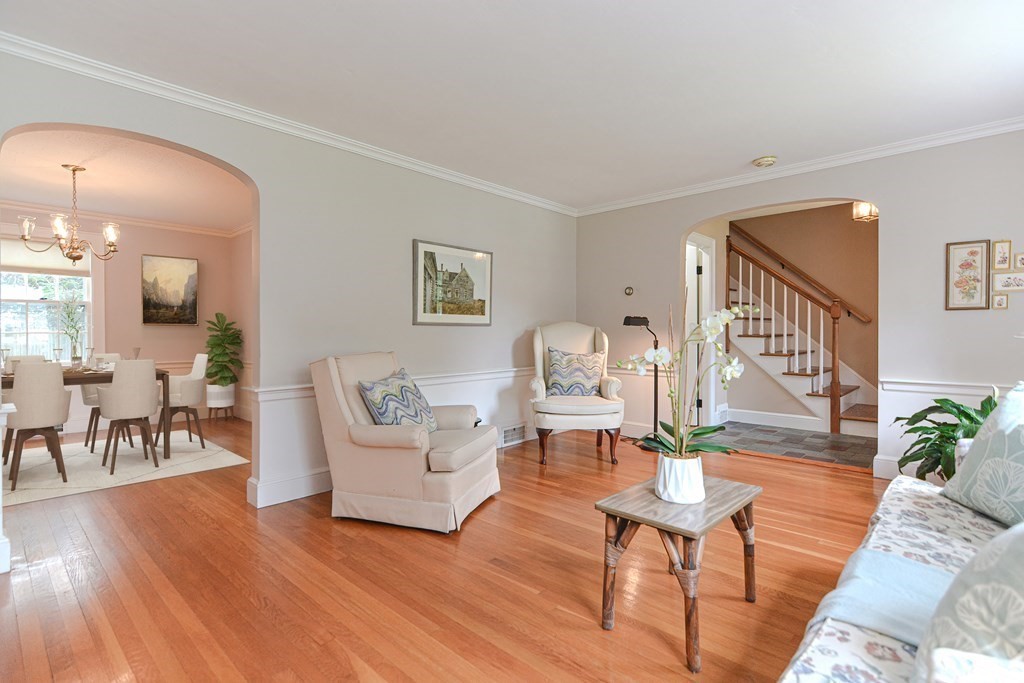 11 Wilde Road Wellesley, MA 02481 - Photo 4 of 26 a living room with fireplace furniture and a wooden floor