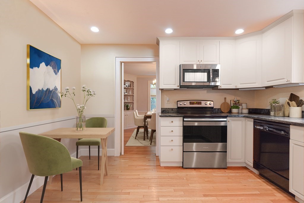 11 Wilde Road Wellesley, MA 02481 - Photo 8 of 26 a kitchen with stainless steel appliances granite countertop a stove top oven a sink dishwasher and a refrigerator with wooden floor