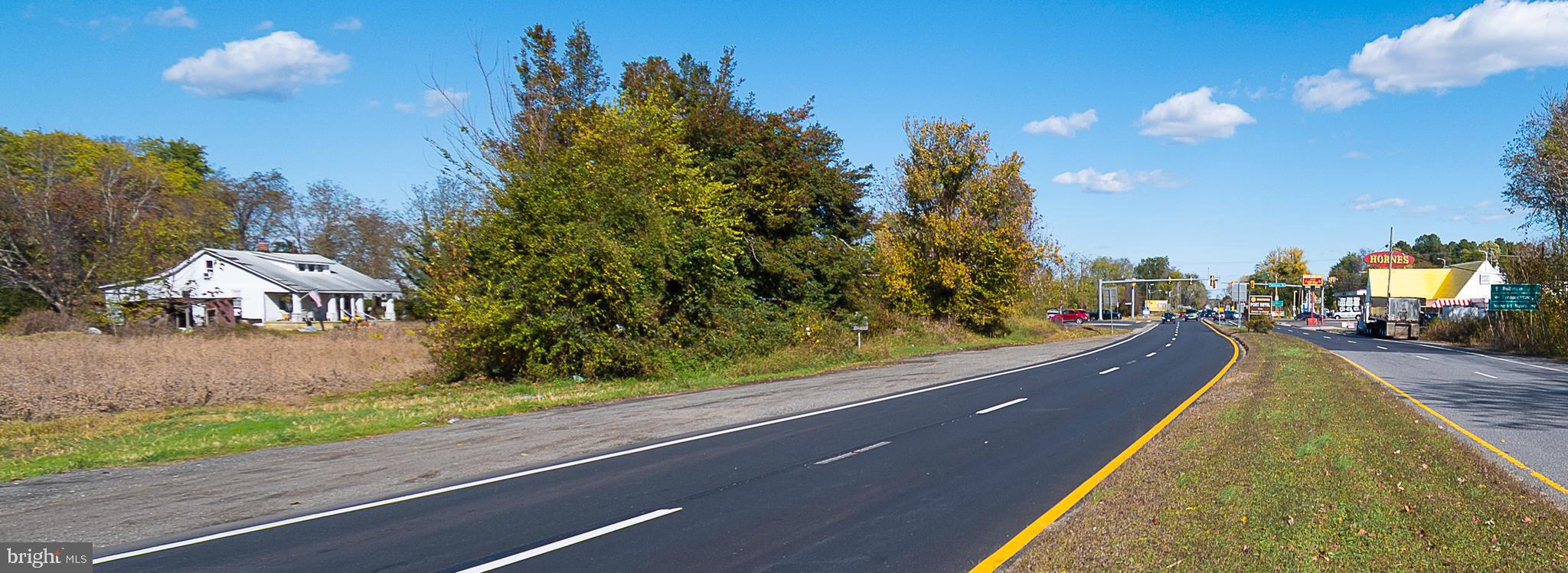 25513 Tidewater Trail Port Royal, VA 22535 - Photo 10 of 10 a view of a street with a building and a street view