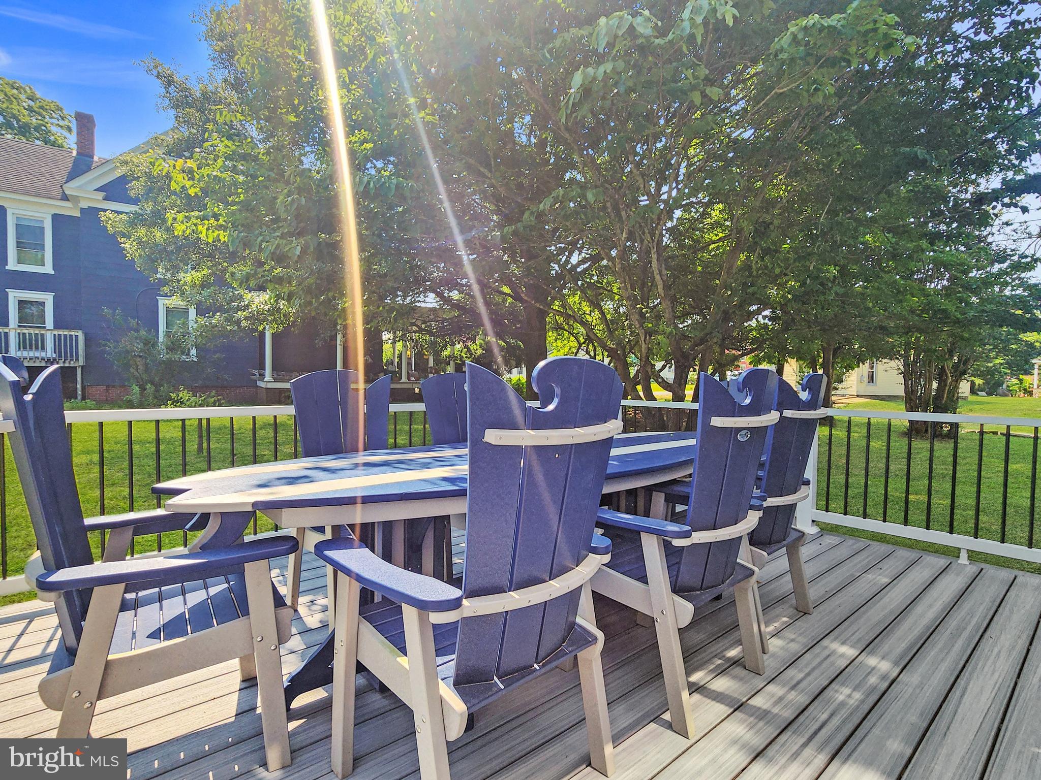 30181 Temperanceville Road Temperanceville, VA 23442 - Photo 18 of 41 a view of an outside dining space with a table and chairs