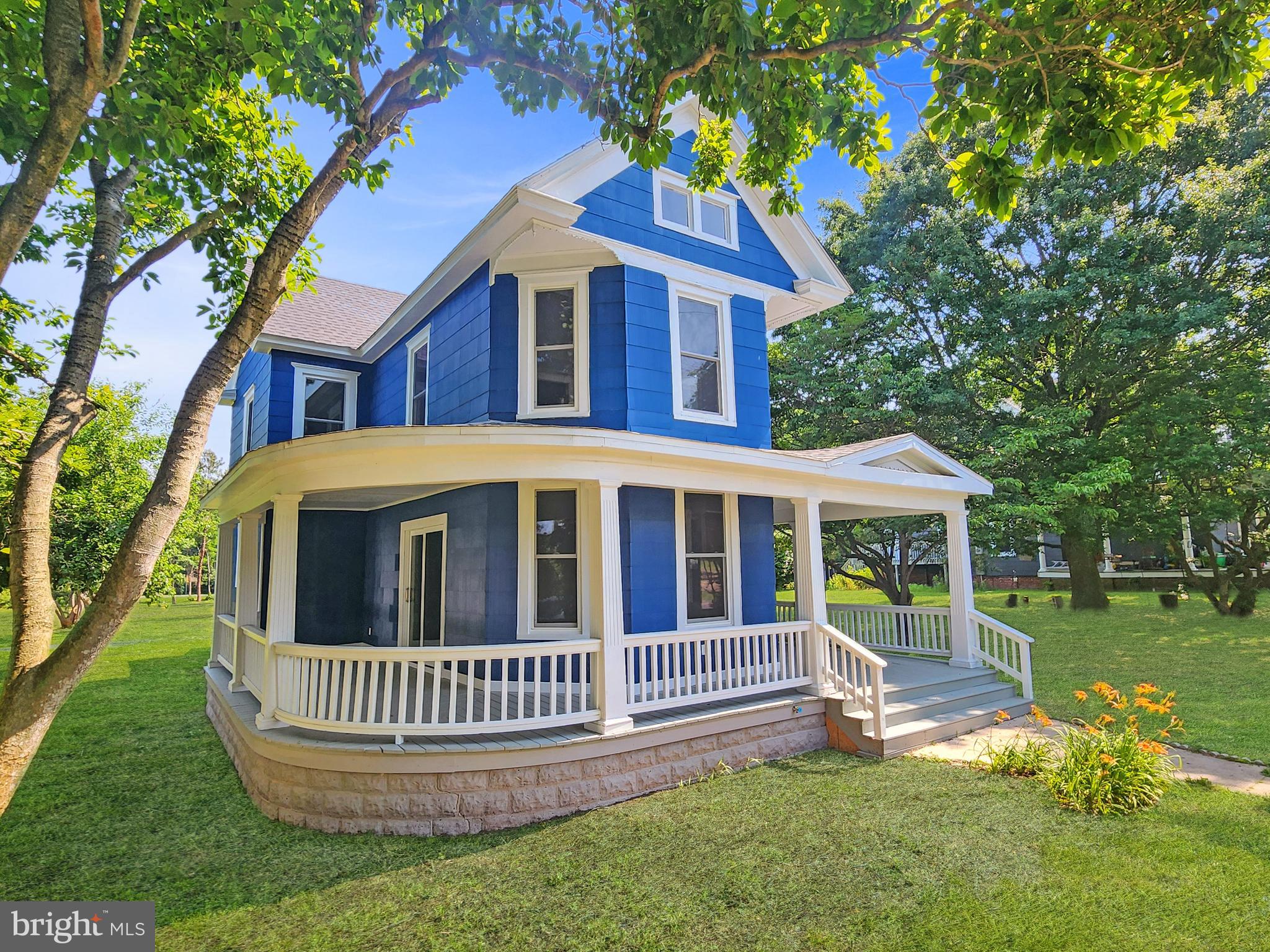 30181 Temperanceville Road Temperanceville, VA 23442 - Photo 2 of 41 a view of a house with a yard and deck