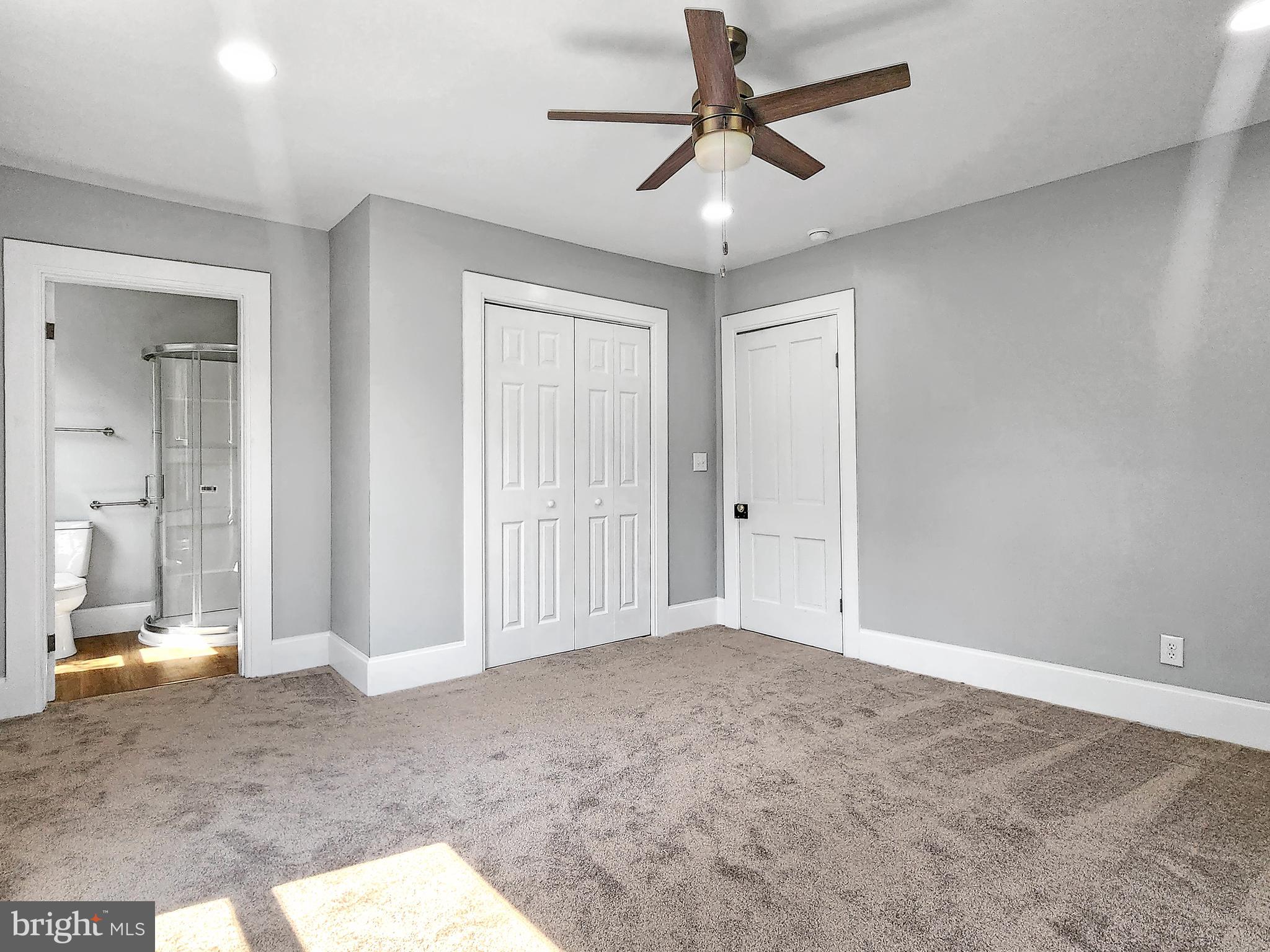 30181 Temperanceville Road Temperanceville, VA 23442 - Photo 35 of 41 an empty room with fan and entrance