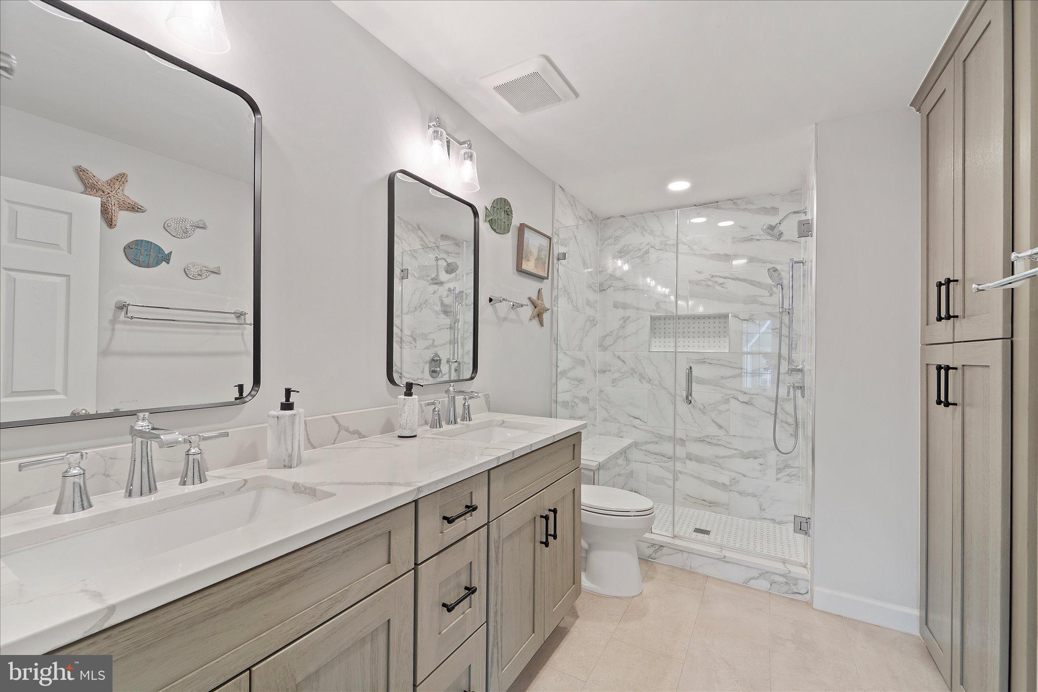 46574 Broadspear Terrace Sterling, VA 20165 - Photo 21 of 41 Updated primary bathroom