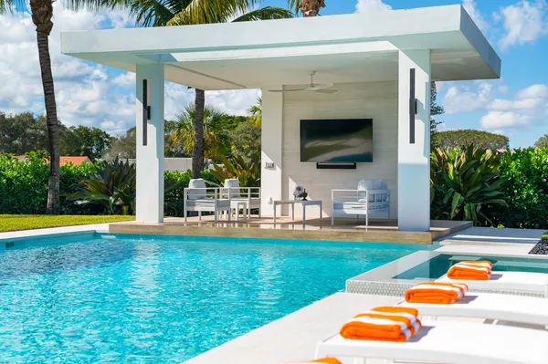 a view of a park with large trees