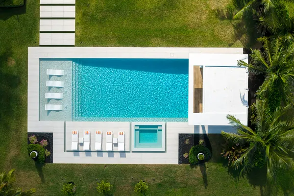 a view of swimming pool with outdoor seating