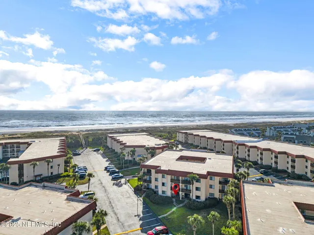 a view of a city with an ocean view