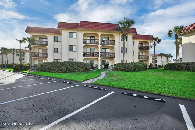 a house view with a seating space and garden
