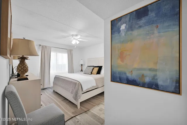 a bedroom with a bed and a closet