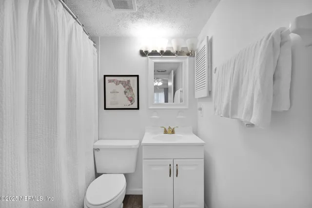 a picture of a city with an ocean view