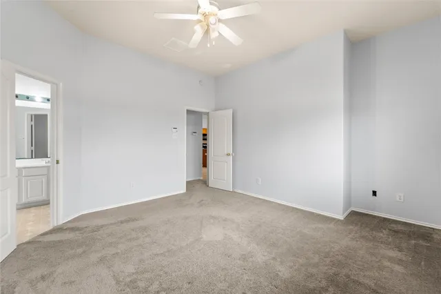 a front view of a house with sitting area and garden