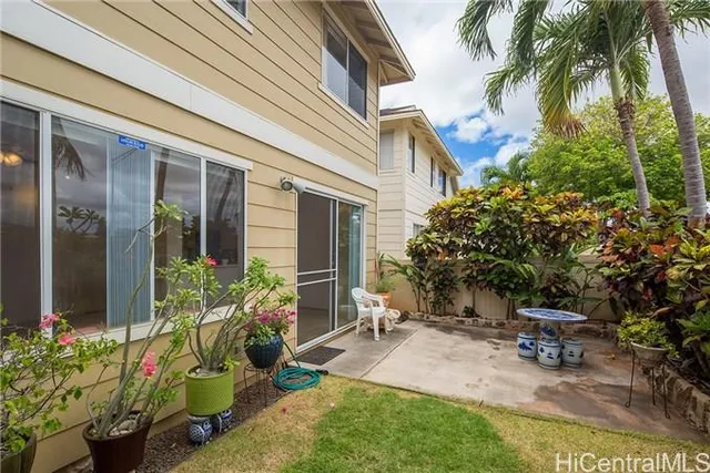 a house with outdoor seating space