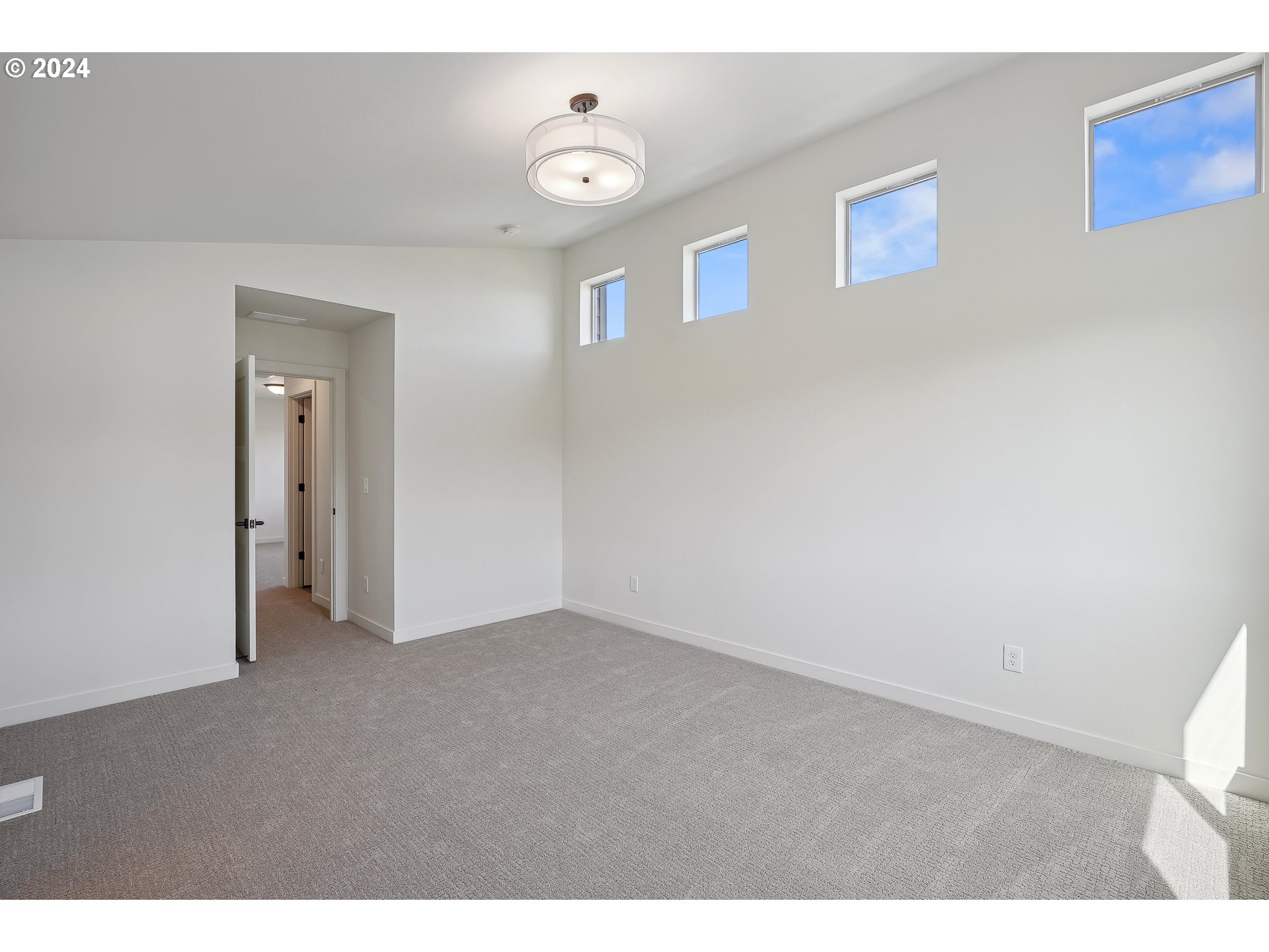 2541 South White Salmon Drive Ridgefield, WA 98642 - Photo 26 of 29 a view of an empty room with a window