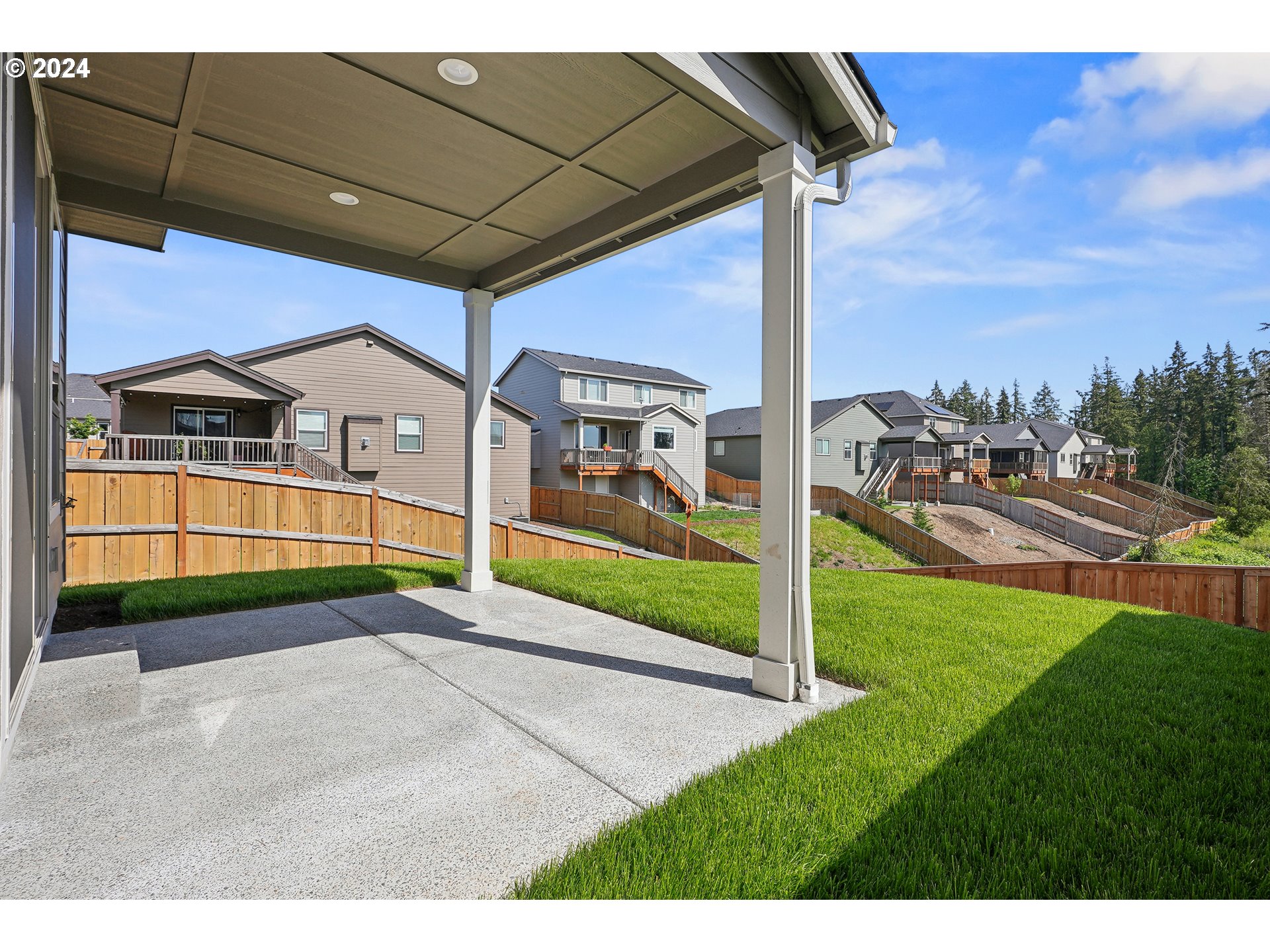2541 South White Salmon Drive Ridgefield, WA 98642 - Photo 27 of 29 a view of a porch with a garden