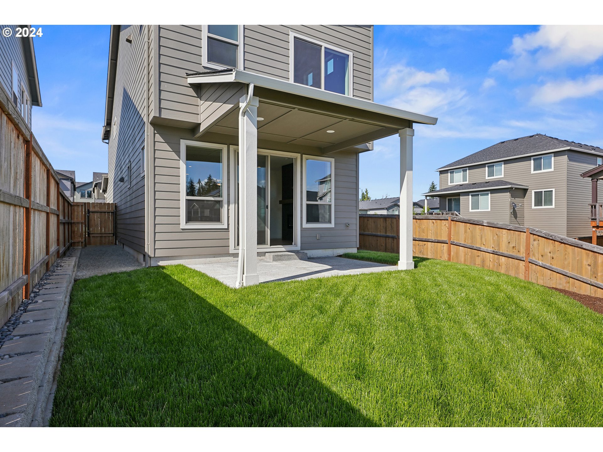 2541 South White Salmon Drive Ridgefield, WA 98642 - Photo 28 of 29 a view of a house with backyard and porch