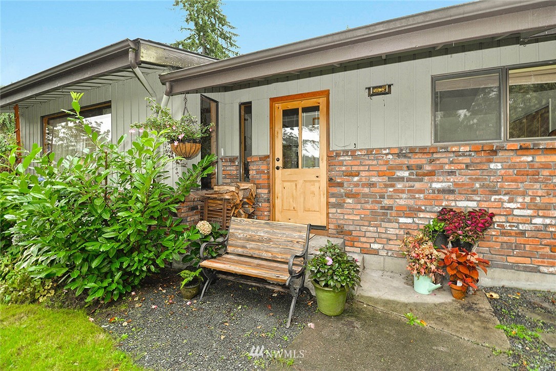 20431 Welch Road Snohomish, WA 98296 - Photo 3 of 25 a front view of a house with outdoor seating