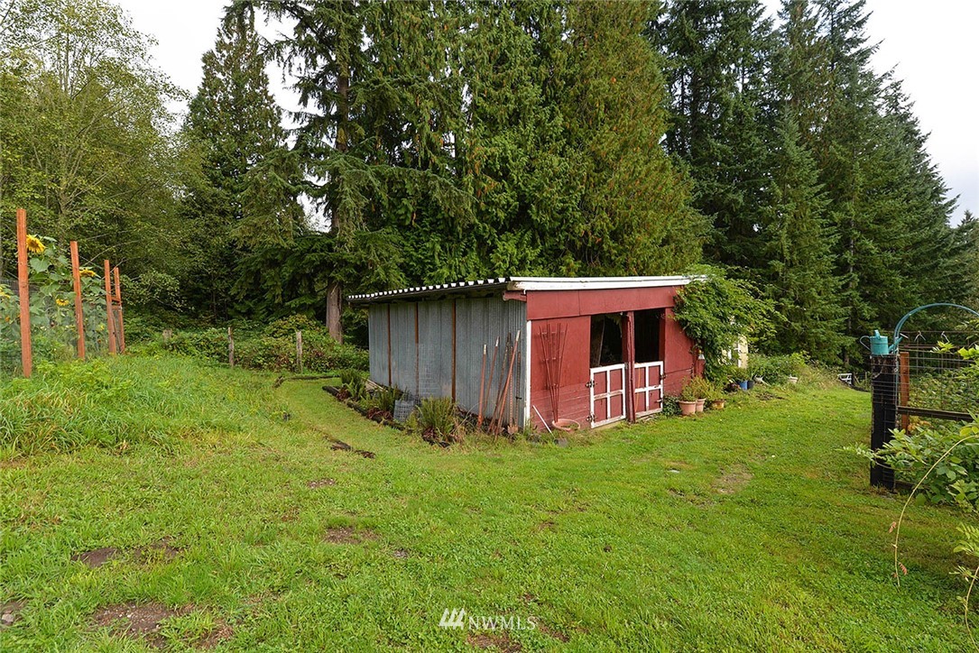 20431 Welch Road Snohomish, WA 98296 - Photo 22 of 25 a view of backyard of house with green space