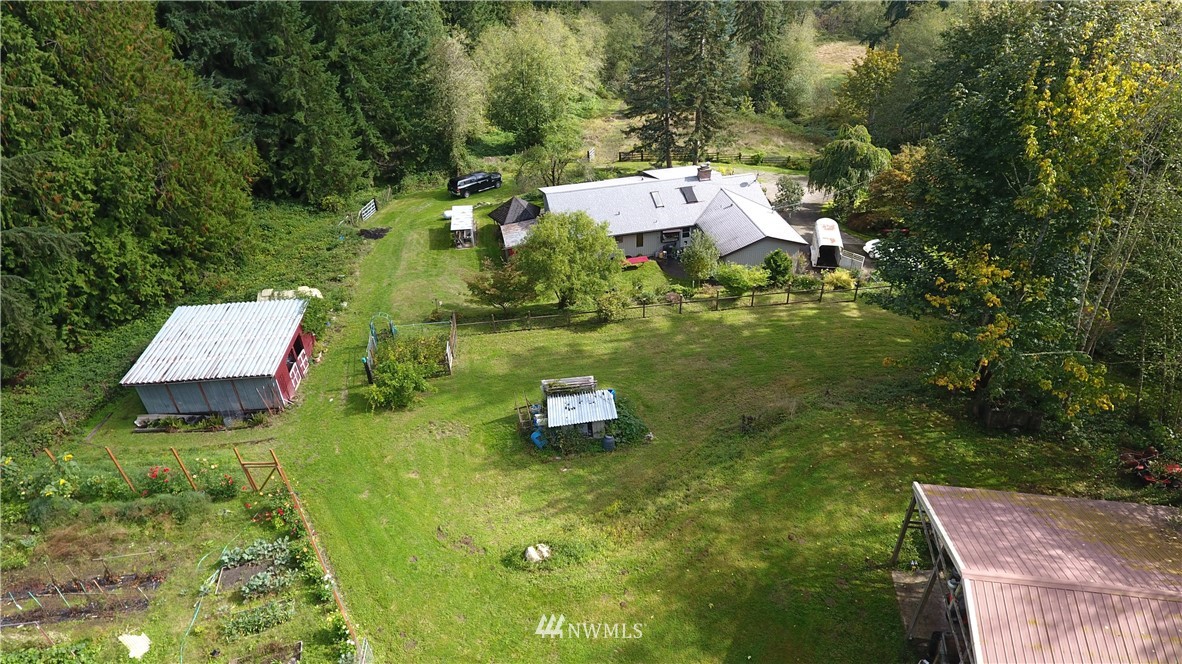 20431 Welch Road Snohomish, WA 98296 - Photo 24 of 25 an aerial view of a house with yard swimming pool and outdoor seating