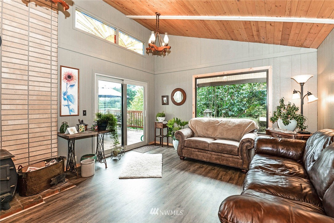 20431 Welch Road Snohomish, WA 98296 - Photo 4 of 25 a living room with furniture and a large window