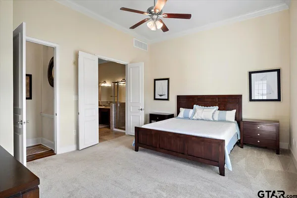 a bedroom with a bed and a view