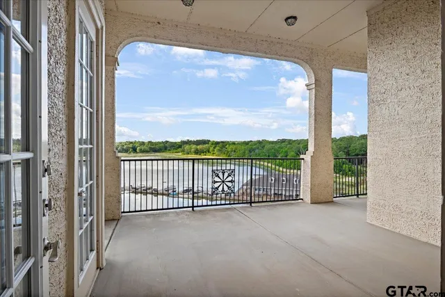 a view of a balcony with an outdoor space