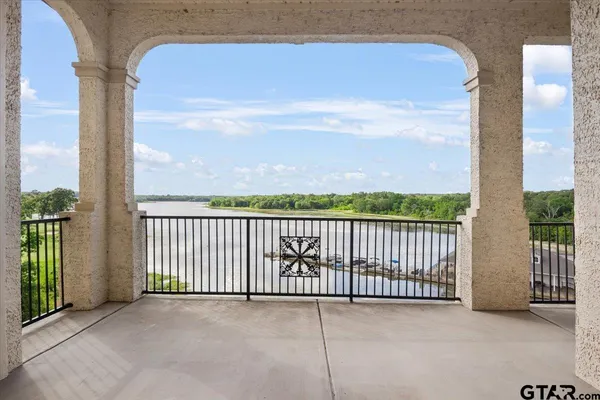 a view of a balcony with an outdoor space
