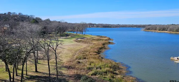 a view of a lake with a mountain in the background