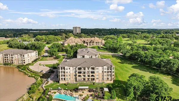 a view of a lake with a garden