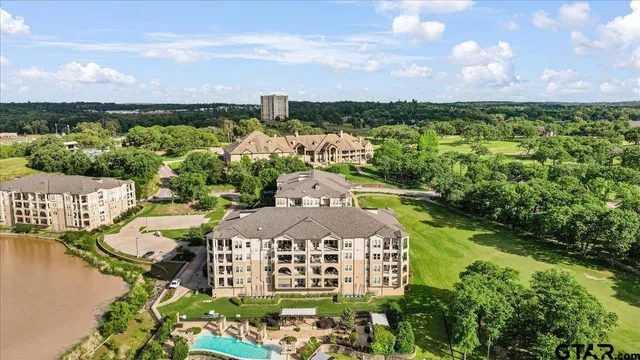 a view of a lake with a city