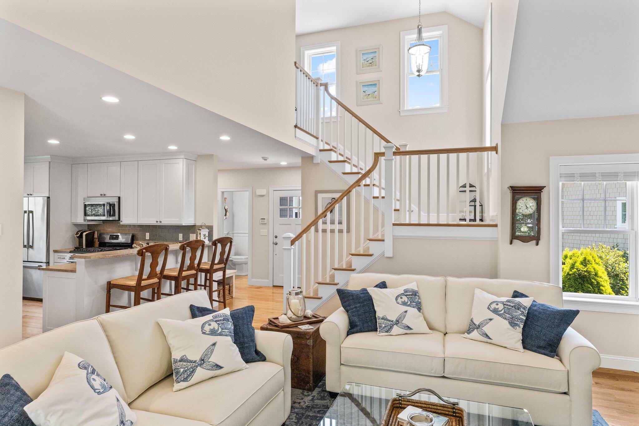 22 Saltwater Circle Mashpee, MA 02649 - Photo 12 of 53 a living room with furniture and a ceiling fan