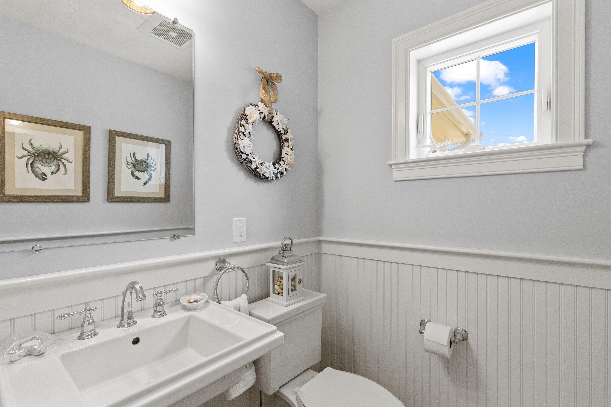 22 Saltwater Circle Mashpee, MA 02649 - Photo 22 of 53 a bathroom with a sink mirror and toilet