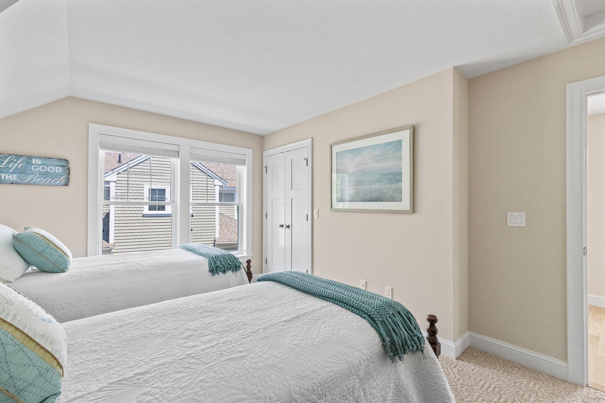 22 Saltwater Circle Mashpee, MA 02649 - Photo 24 of 53 a bedroom with a large bed and a window