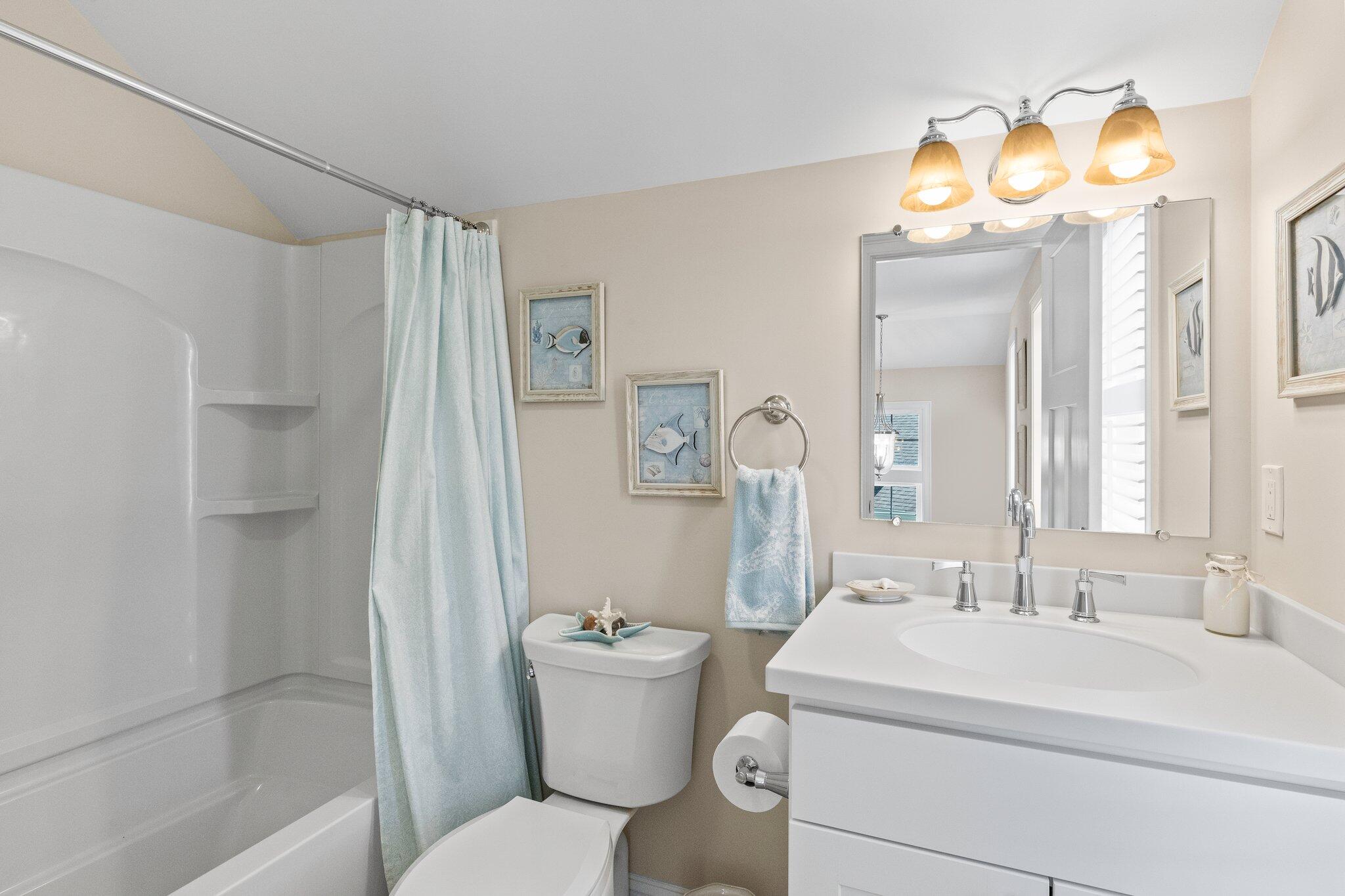 22 Saltwater Circle Mashpee, MA 02649 - Photo 25 of 53 a bathroom with a sink toilet and shower