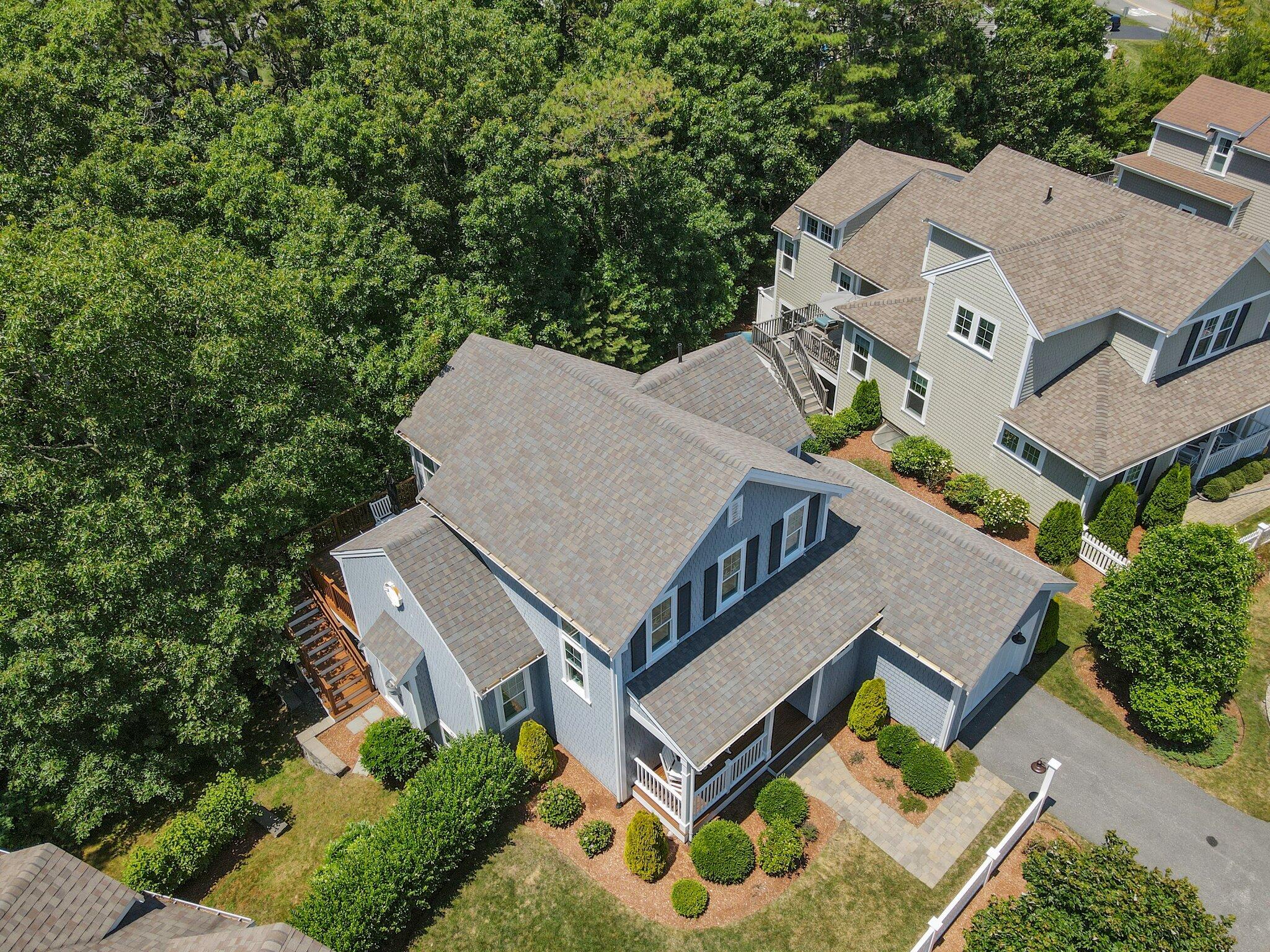 22 Saltwater Circle Mashpee, MA 02649 - Photo 40 of 53 an aerial view of a house with a yard and trees