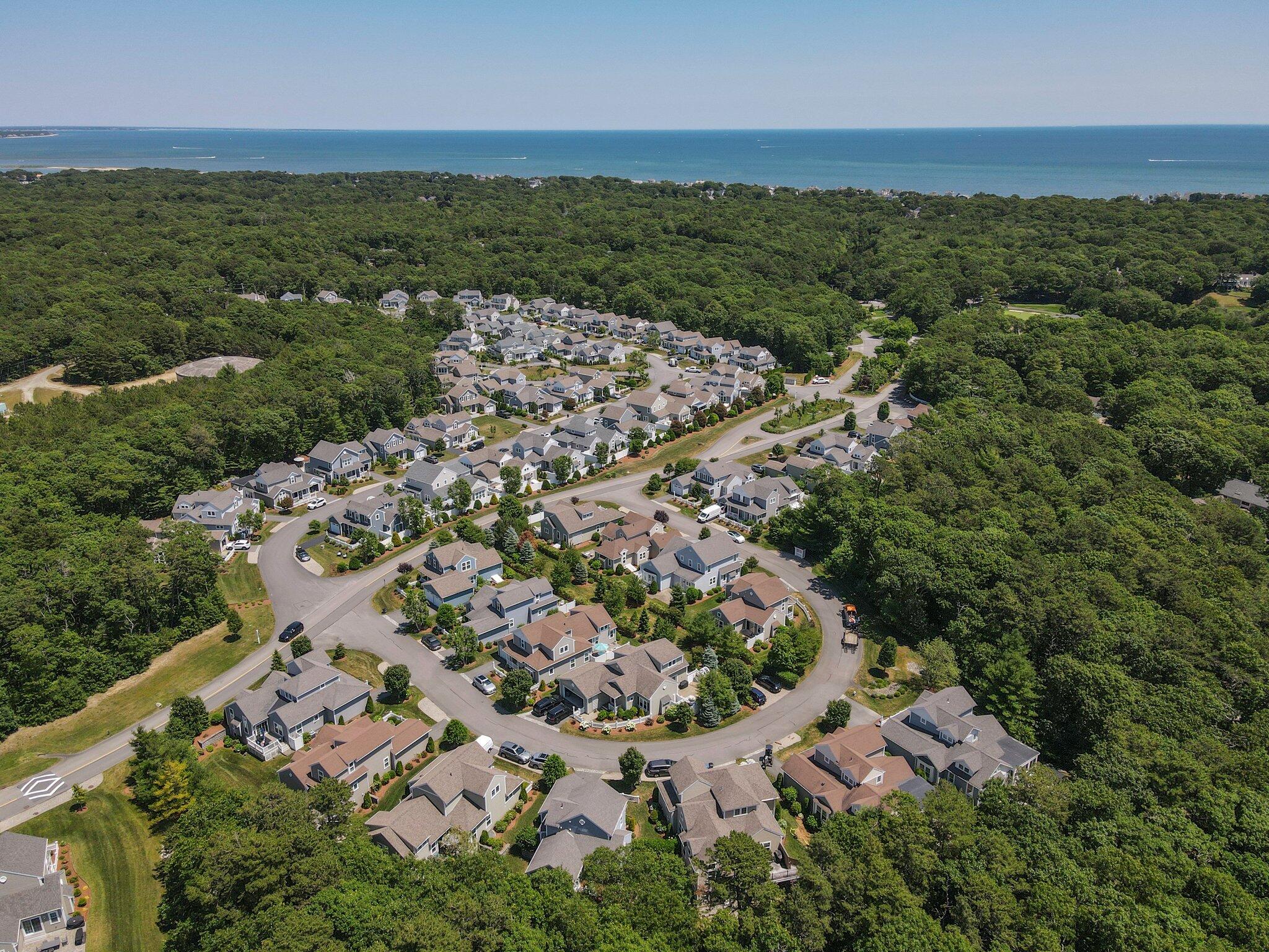 22 Saltwater Circle Mashpee, MA 02649 - Photo 42 of 53 an aerial view of residential houses with outdoor space