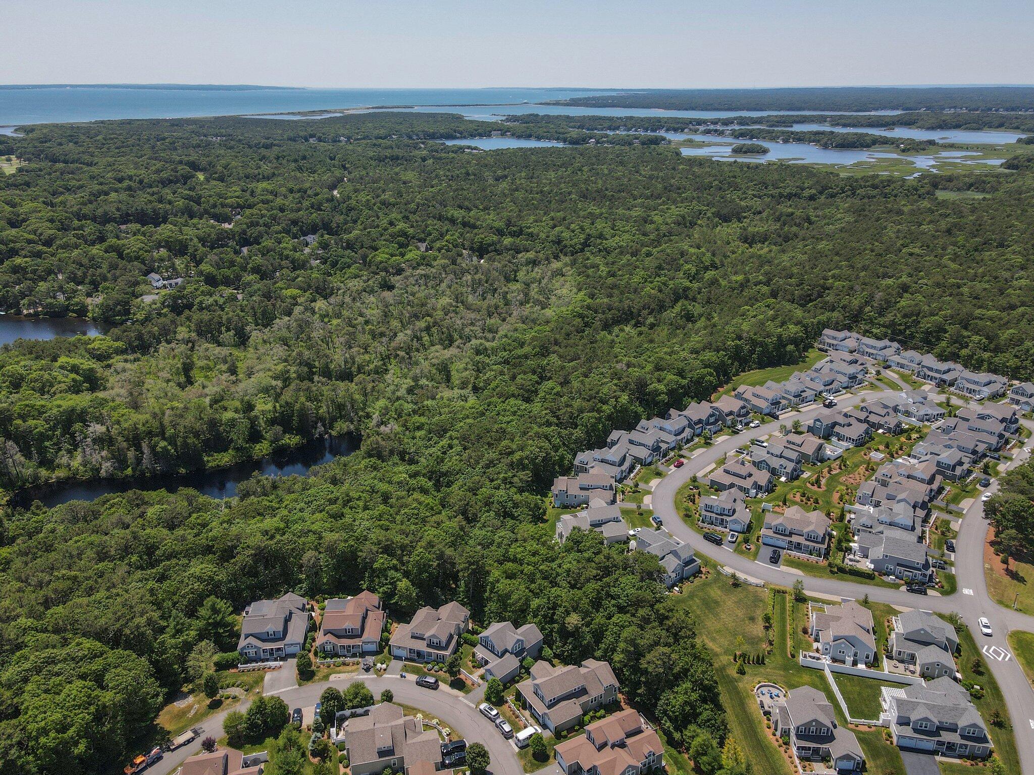 22 Saltwater Circle Mashpee, MA 02649 - Photo 43 of 53 a view of a water with an outdoor space