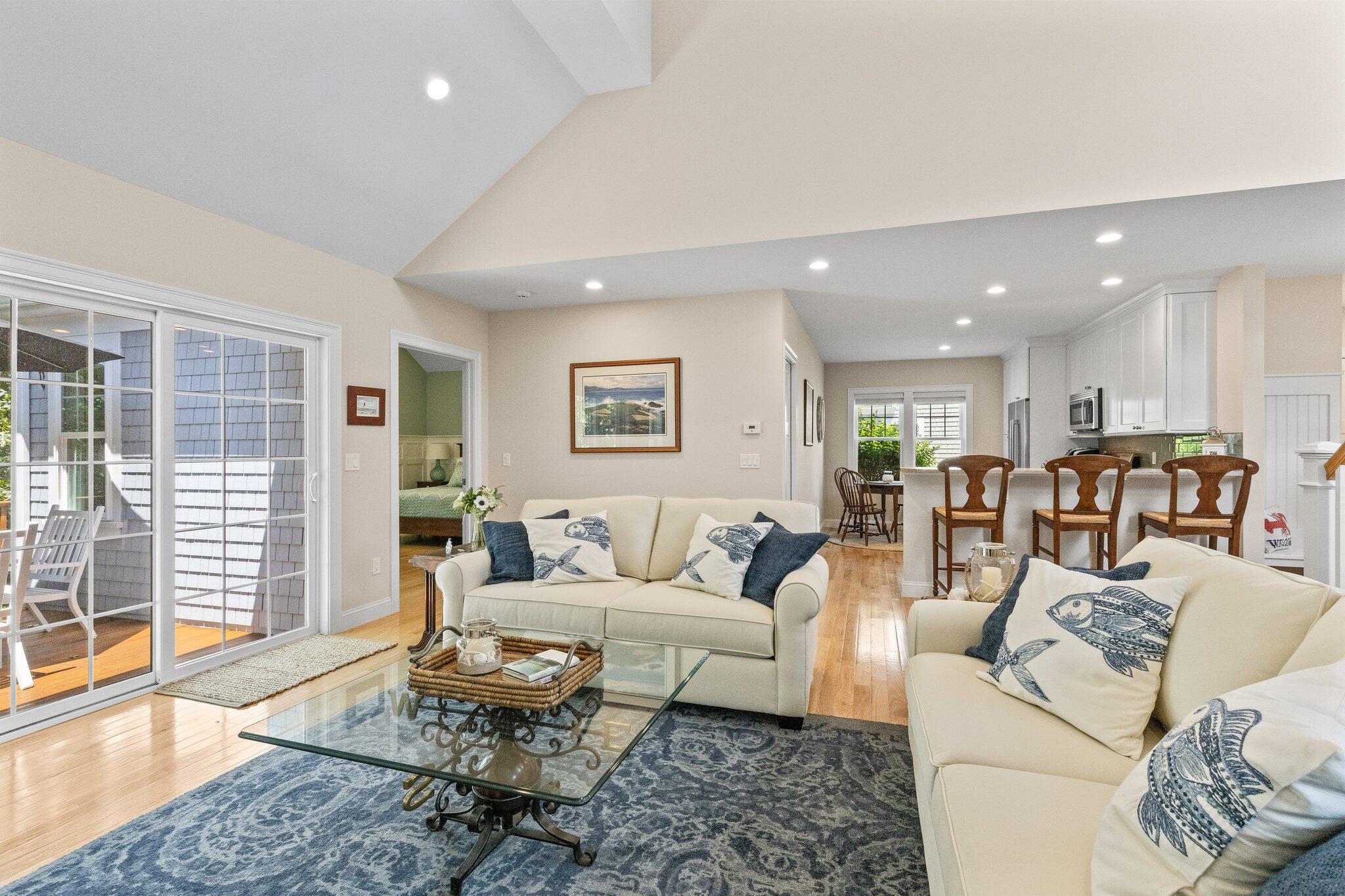 22 Saltwater Circle Mashpee, MA 02649 - Photo 10 of 53 a living room with furniture and a table