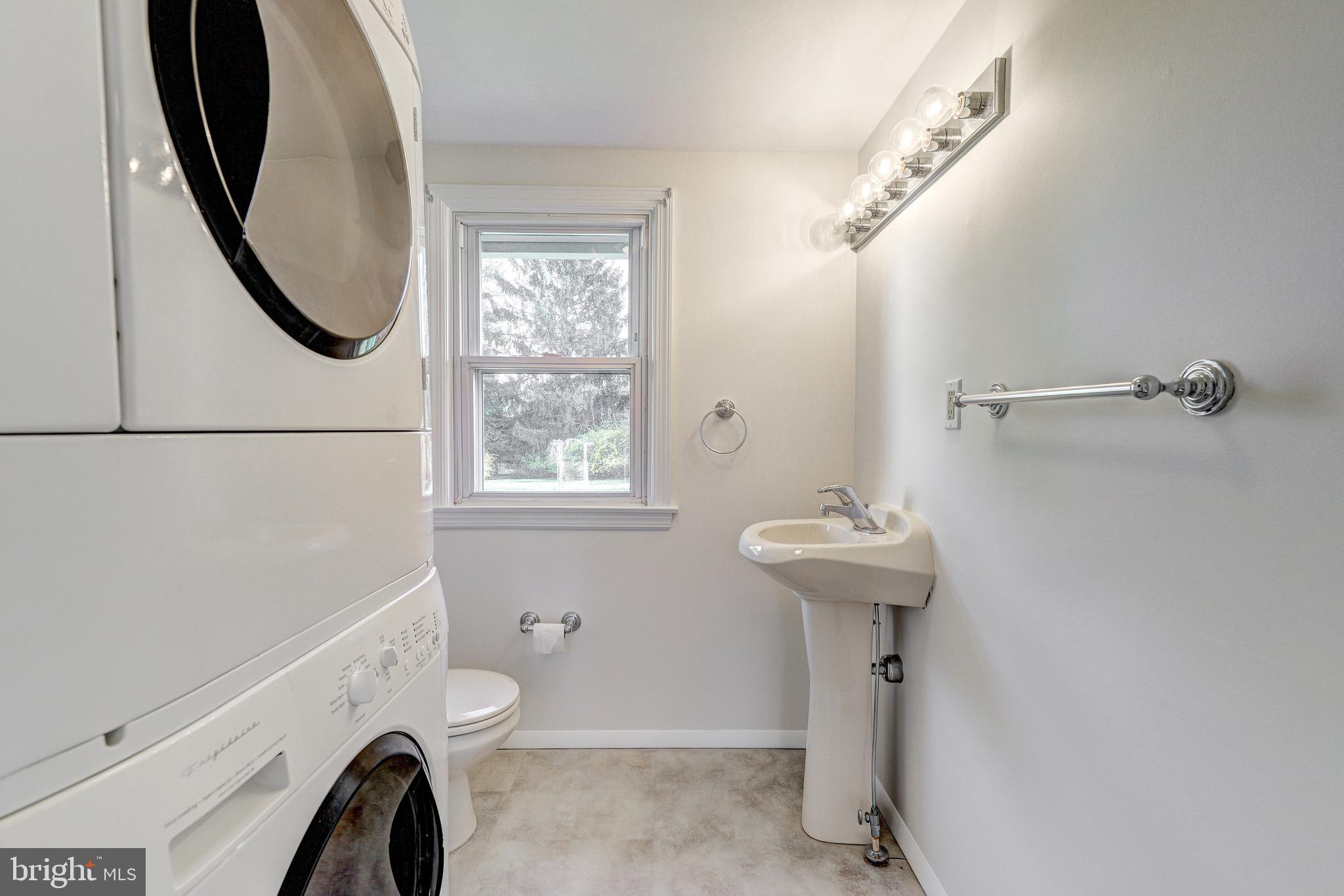 2409 Crestnoll Road Reisterstown, MD 21136 - Photo 42 of 51 Powder Rm and laundry in apartment