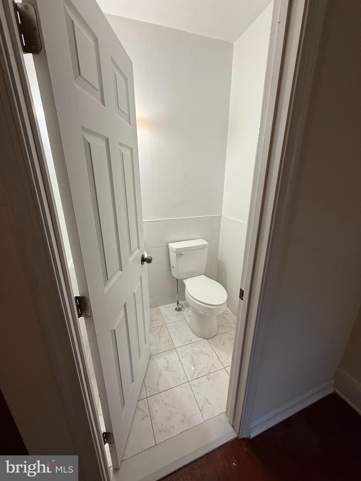 3309 Brighton Street Baltimore, MD 21216 - Photo 16 of 32 a bathroom with a sink and a vanity