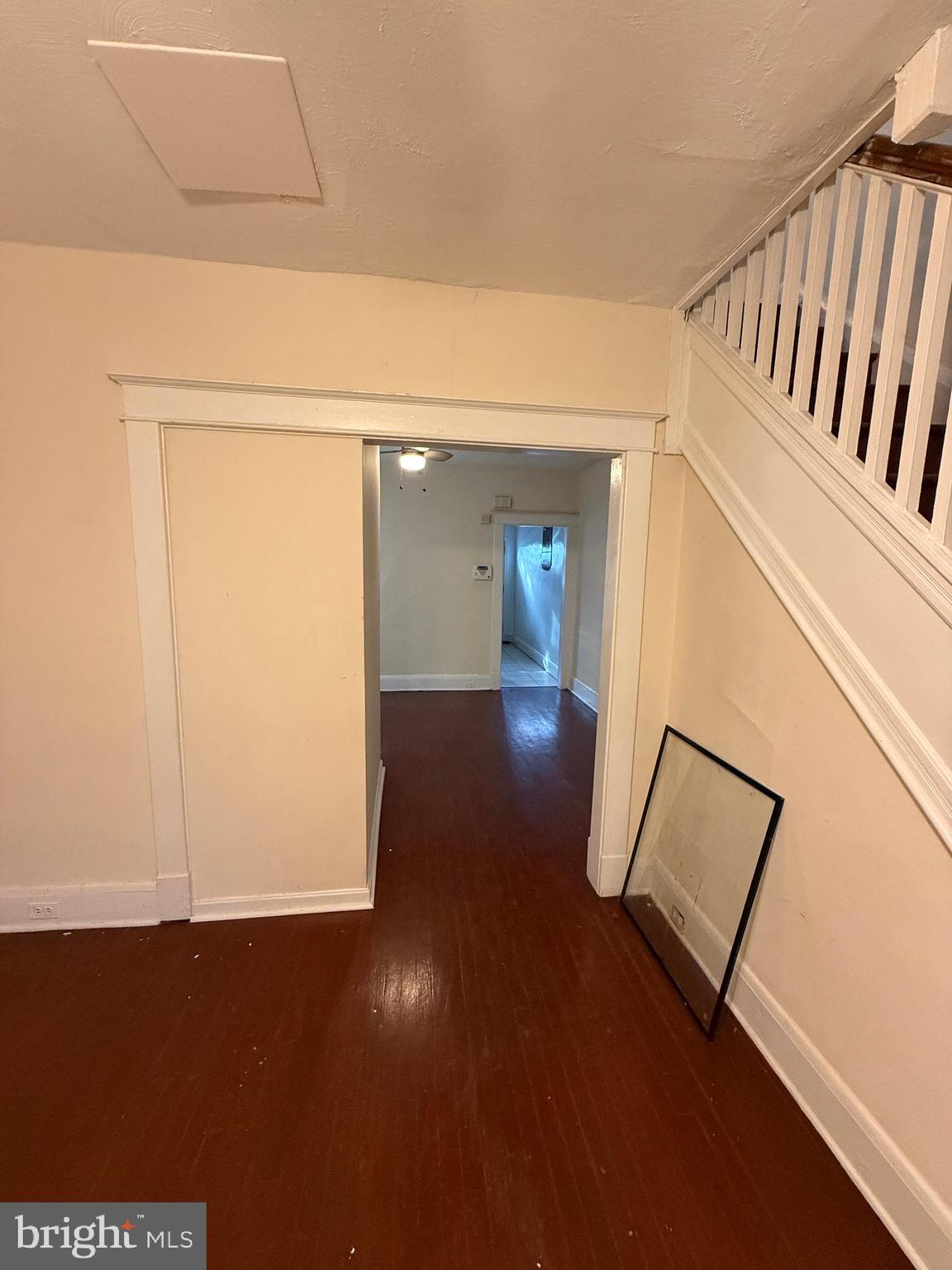 3309 Brighton Street Baltimore, MD 21216 - Photo 23 of 32 a view of hallway with wooden floor