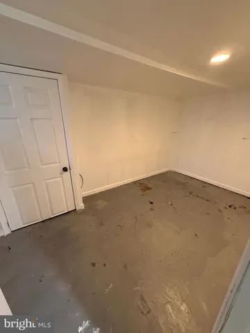 an empty room with white door