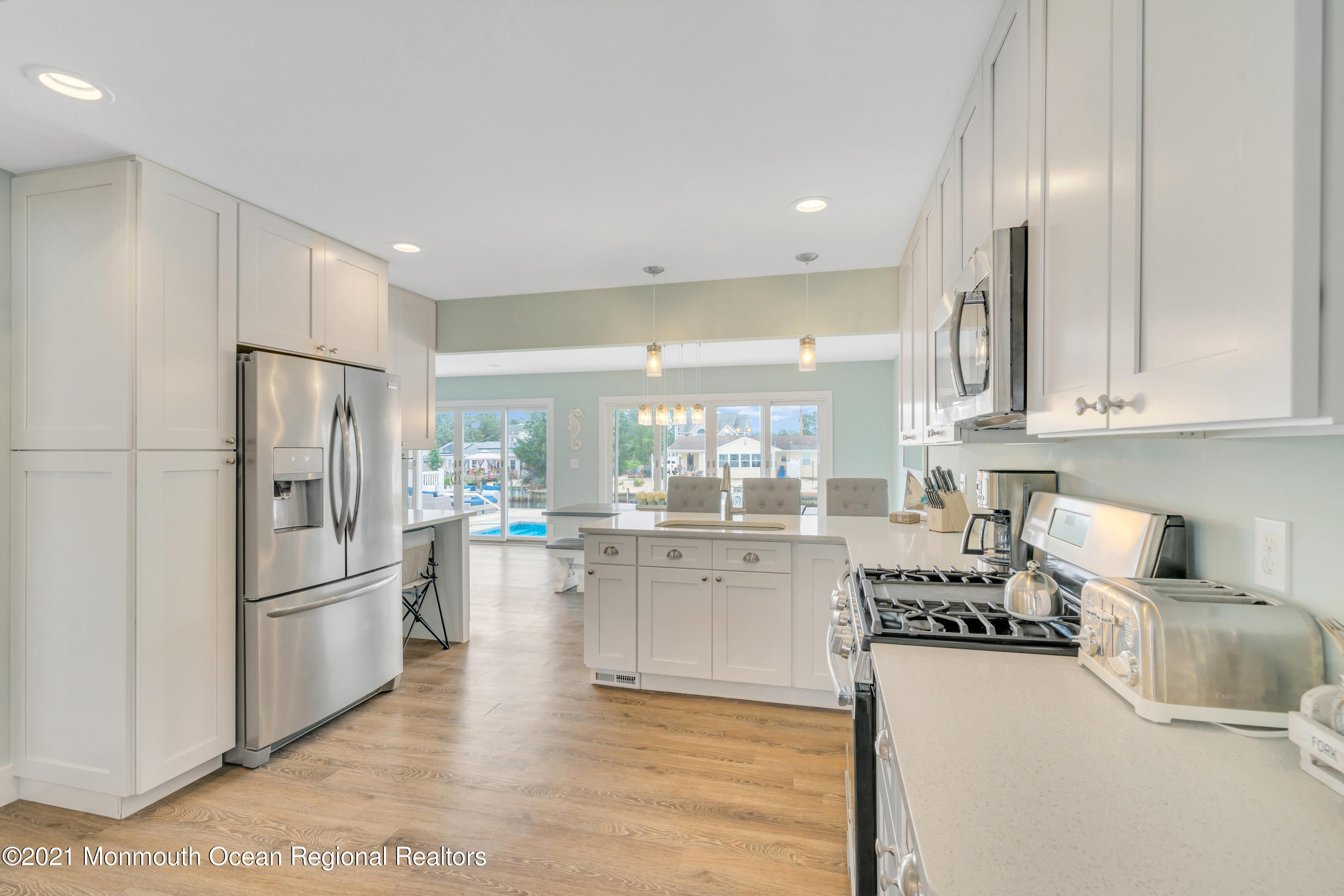 28 Harbor Inn Road Bayville, NJ 08721 - Photo 11 of 52 a kitchen with refrigerator and cabinets