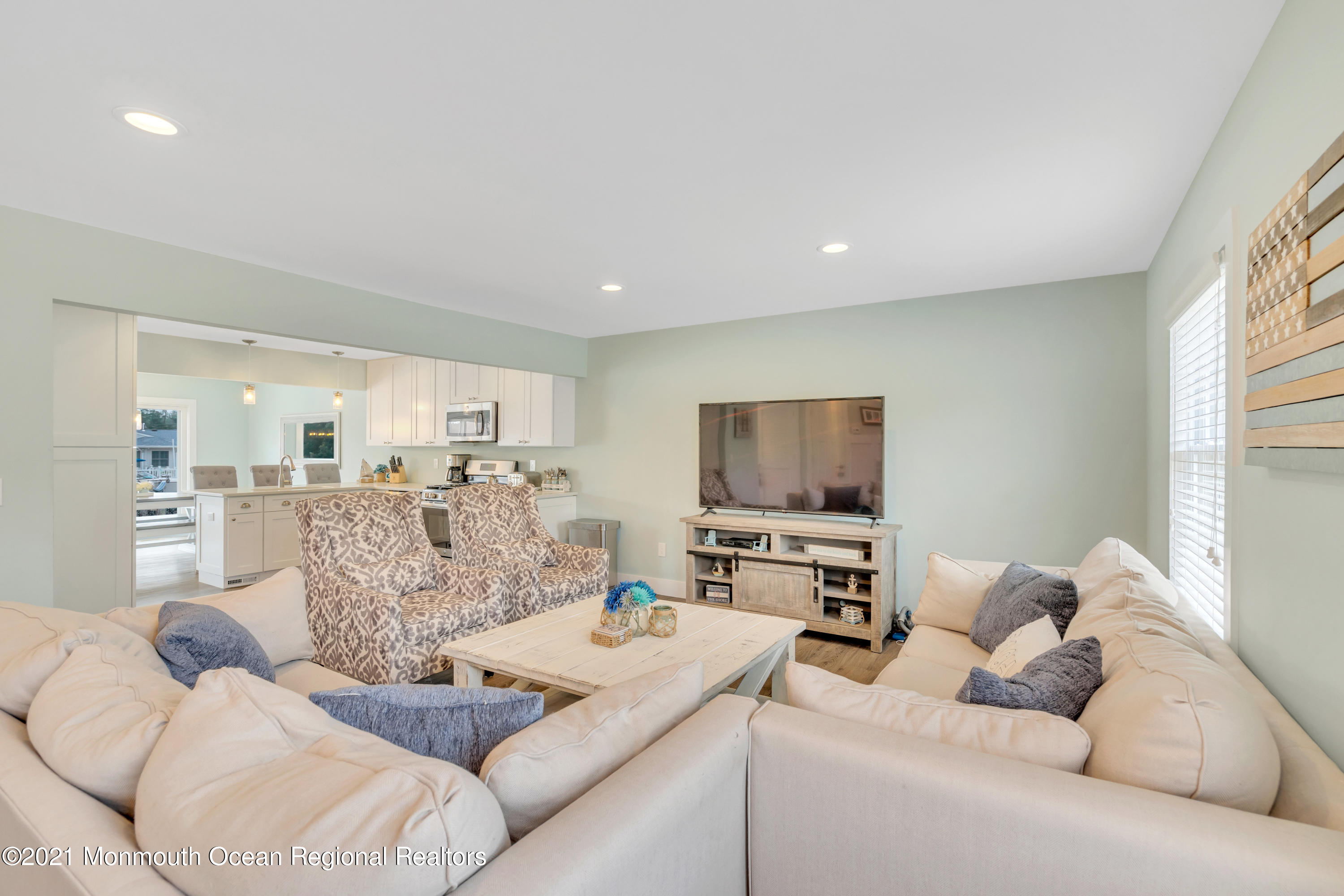 28 Harbor Inn Road Bayville, NJ 08721 - Photo 12 of 52 a living room with furniture and a flat screen tv