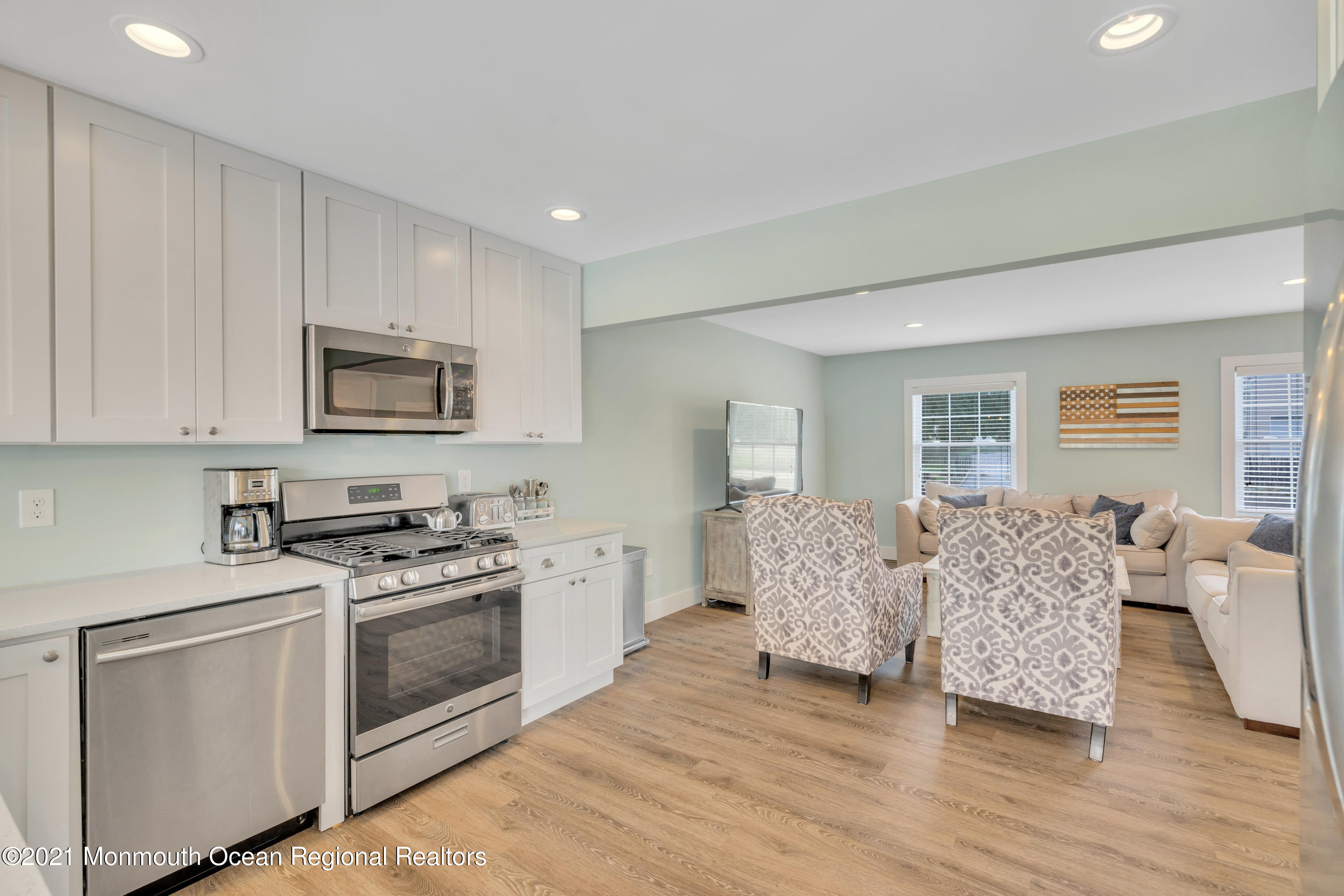 28 Harbor Inn Road Bayville, NJ 08721 - Photo 20 of 52 a living room with furniture and a wooden floor